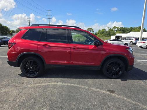 Radiant Red Metallic II 2025 Honda Passport AWD Black