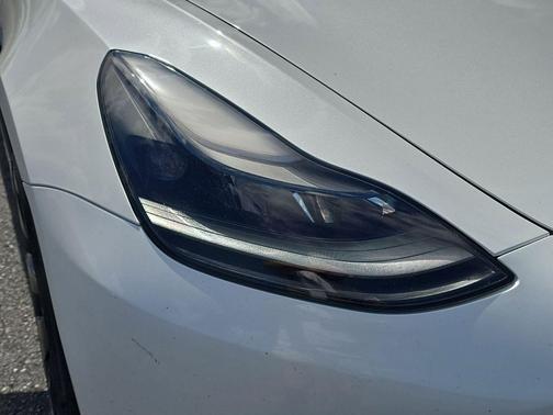 Pearl White Multi-Coat 2023 Tesla Model 3 Performance