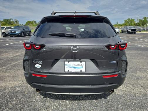 Machine Gray 2025 Mazda CX-50 Hybrid Premium Plus Package
