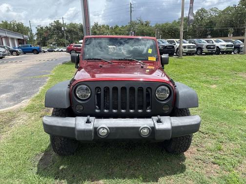 Red Rock Crystal 2010 Jeep Wrangler Sport