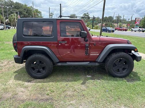 Red Rock Crystal 2010 Jeep Wrangler Sport