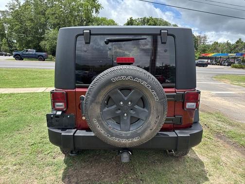 Red Rock Crystal 2010 Jeep Wrangler Sport