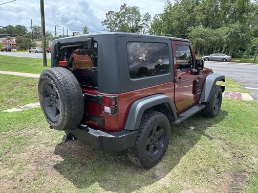 Red Rock Crystal 2010 Jeep Wrangler Sport