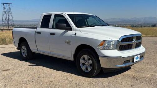 Bright White 2024 RAM 1500 Classic SLT Quad Cab 4x4 64' Box