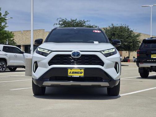 Wind Chill Pearl/Midnight Black Metallic 2023 Toyota RAV4 Hybrid SE