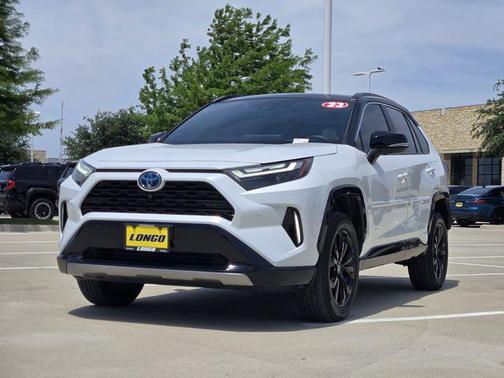 Wind Chill Pearl/Midnight Black Metallic 2023 Toyota RAV4 Hybrid SE