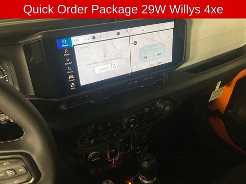 Orange 2025 Jeep Wrangler 4xe Sport