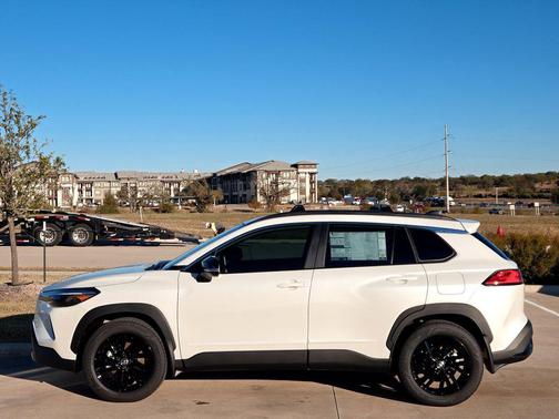 Wind Chill Pearl/Jet Black 2026 Toyota Corolla Hybrid SE