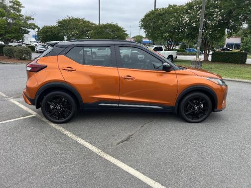 Monarch Orange / Super Black 2023 Nissan Kicks SR