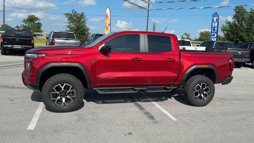 Volcanic Red 2024 GMC Canyon AT4X