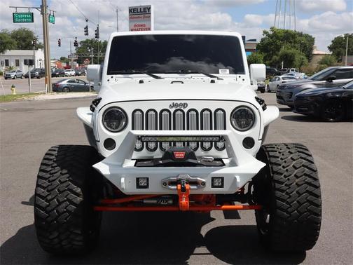 Photo 2 of 42 of 2014 Jeep Wrangler Unlimited Sahara