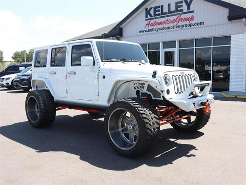 Photo 1 of 42 of 2014 Jeep Wrangler Unlimited Sahara