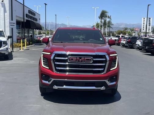 Volcanic Red Tintcoat 2026 GMC Yukon 4WD Elevation