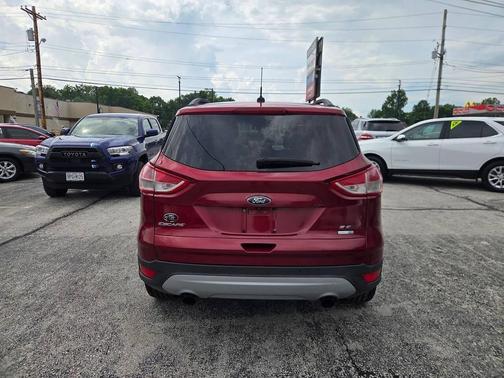 Ruby Red Metallic Tinted Clearcoat 2016 Ford Escape SE