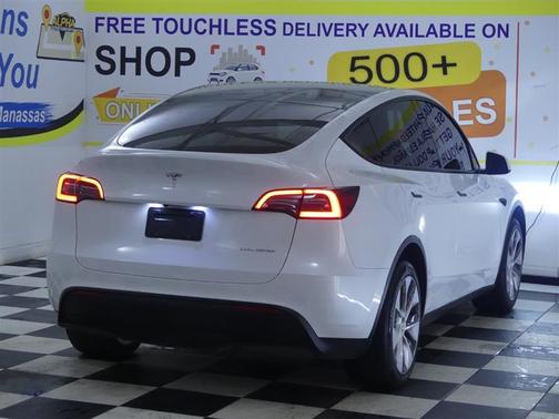 Pearl White Multi-Coat 2023 Tesla Model Y Long Range Dual Motor All-Wheel Drive