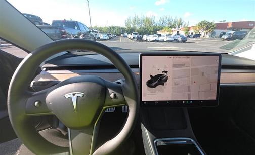 Gray 2023 Tesla Model 3 Performance
