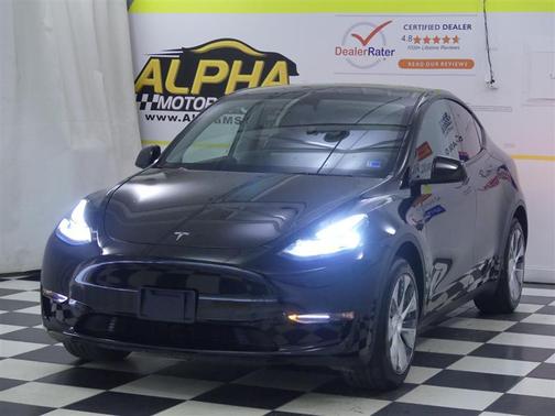 Solid Black 2024 Tesla Model Y