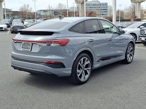 Pebble Gray 2025 Audi Q4 e-tron Sportback Premium Plus 55 quattro