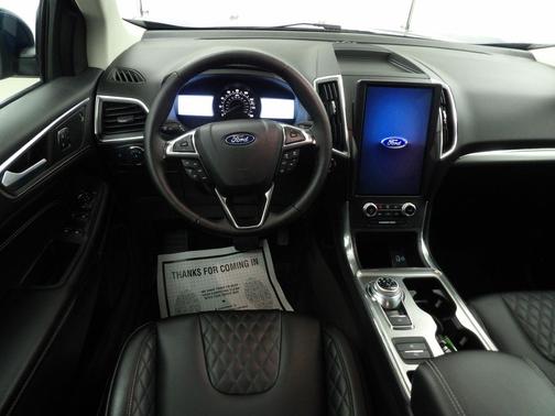 Atlas Blue Metallic 2024 Ford Edge Titanium