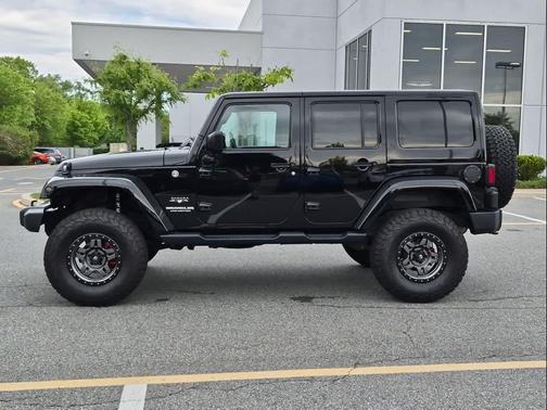 Black Clearcoat 2016 Jeep Wrangler Unlimited Sahara