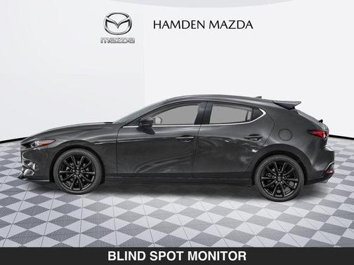 Machine Gray Metallic 2026 Mazda Mazda3 AWD w/Premium Package