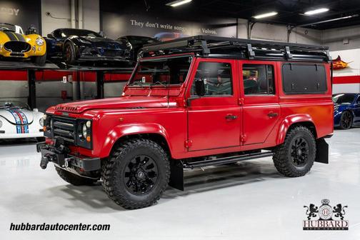 Red 1995 Land Rover Defender