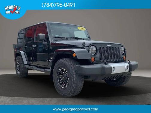 Black 2013 Jeep Wrangler Unlimited Sahara