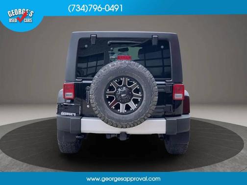 Black 2013 Jeep Wrangler Unlimited Sahara