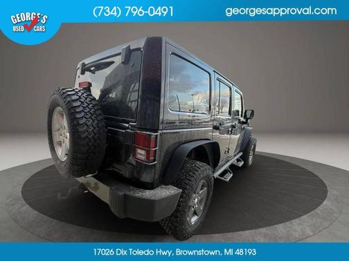 Black 2011 Jeep Wrangler Unlimited Sport