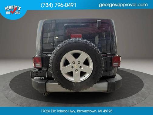 Black 2011 Jeep Wrangler Unlimited Sport