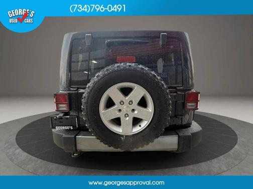Black 2011 Jeep Wrangler Unlimited Sport