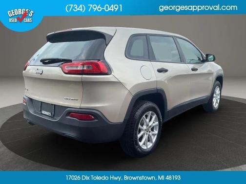 Beige 2014 Jeep Cherokee Sport