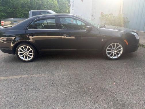 Tuxedo Black Clearcoat Metallic 2010 Mercury Milan Premier