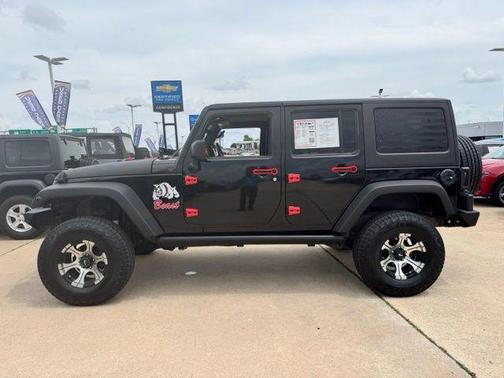 Black Clearcoat 2012 Jeep Wrangler Unlimited Sport