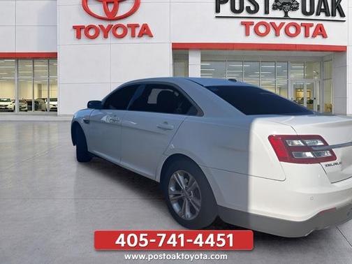 White 2015 Ford Taurus SEL