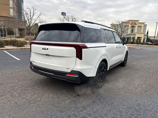 Snow White Pearl 2026 Kia Carnival Hybrid SX Prestige