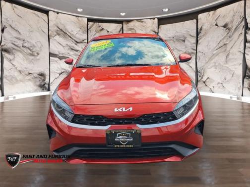 Orange 2024 Kia Forte LXS