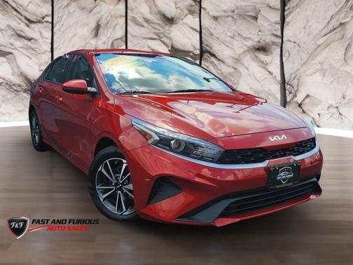 Orange 2024 Kia Forte LXS