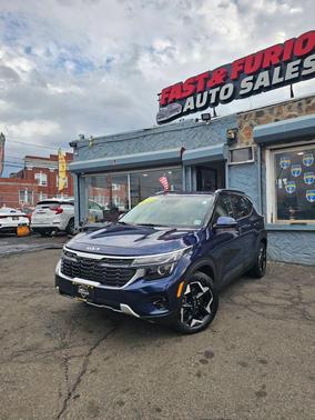 Blue 2024 Kia Seltos EX