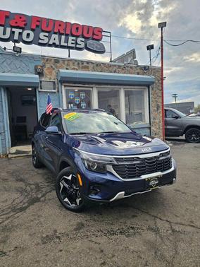 Blue 2024 Kia Seltos EX