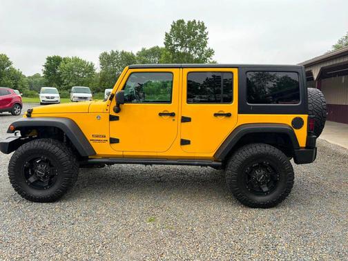 Baja Yellow Clearcoat 2015 Jeep Wrangler Unlimited Sport