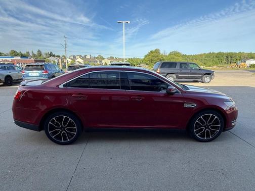 Red 2017 Ford Taurus SEL