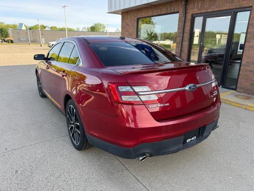 Red 2017 Ford Taurus SEL