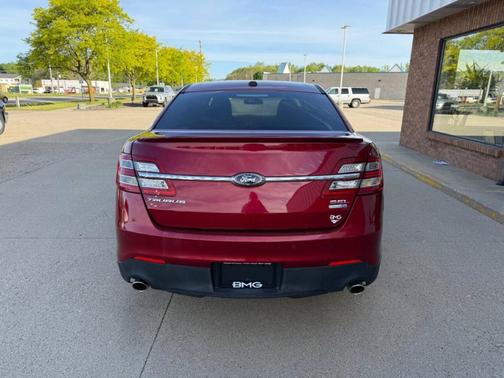 Red 2017 Ford Taurus SEL