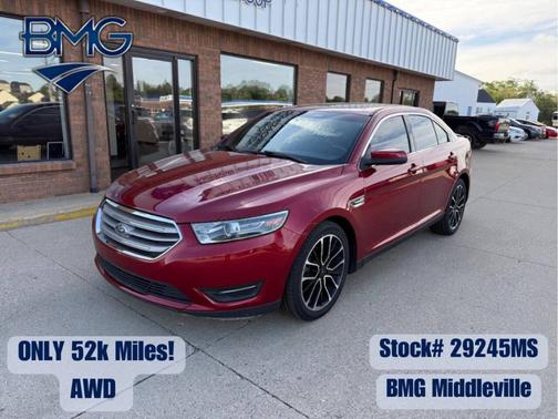 Red 2017 Ford Taurus SEL