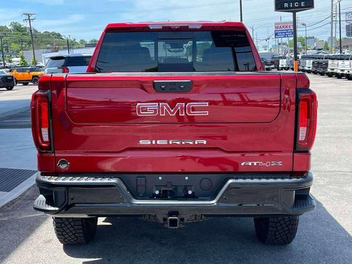 Volcanic Red Tintcoat 2026 GMC Sierra 1500 AT4X