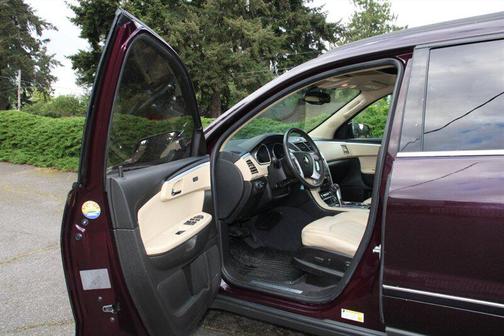 Purple 2010 Chevrolet Traverse LTZ