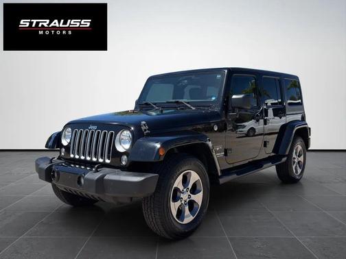 Black 2016 Jeep Wrangler Unlimited Sahara