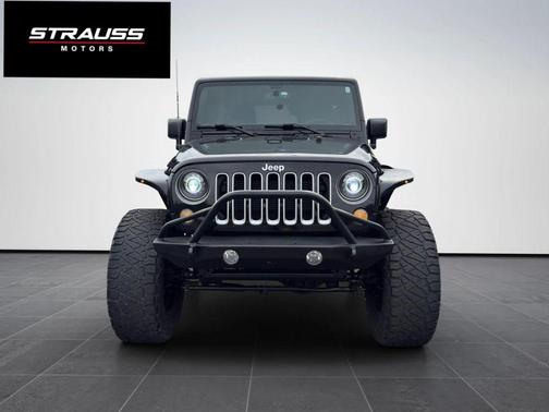 Black 2016 Jeep Wrangler Unlimited Sahara