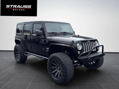 Black 2016 Jeep Wrangler Unlimited Sahara